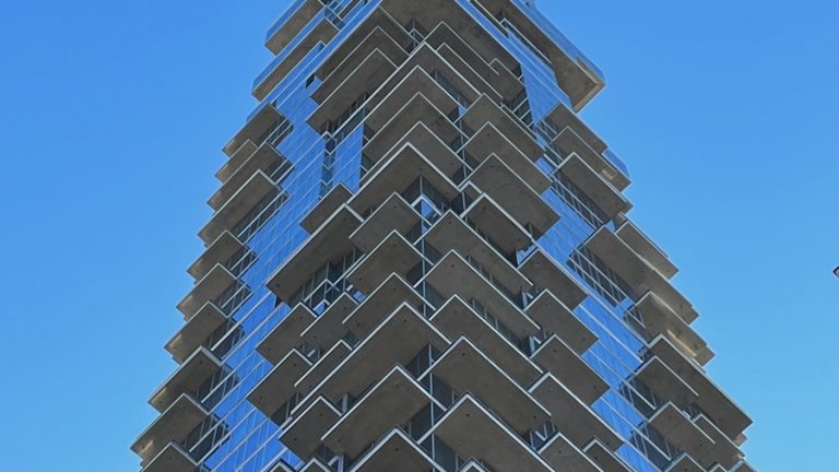 a very tall building with many windows on it