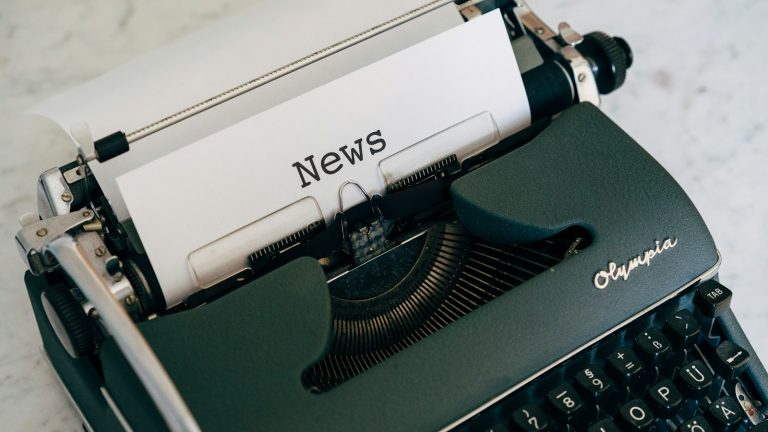 a close up of an old fashioned typewriter